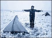 Kathryn Hannay celebrates pitching her tent on her first day of the Sierra Club Activist Backpack to the Arctic National Wildlife Refuge.